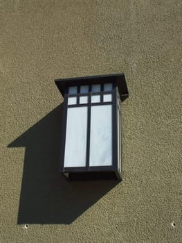 Close up of an outdoor light fixture.