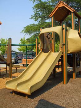 New playground in a schoolyard in summer.