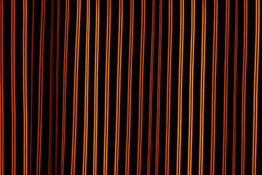 Abstract background with vertical lines on black surface