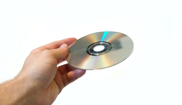 CD in a human hand