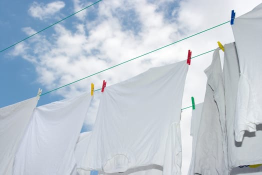 White clothes drying on the rope