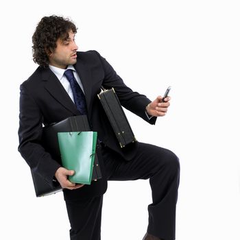 busy man with briefcase and mobilephone