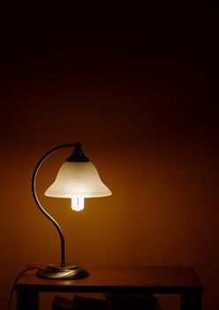 Lamp on a table illuminating the night