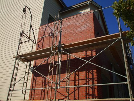 Close up of a building under construction.