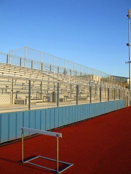 Empty bleachers on a stadium in a park.