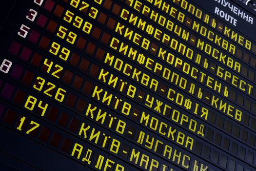 Schedule board at a railway station with cyrillic letters
