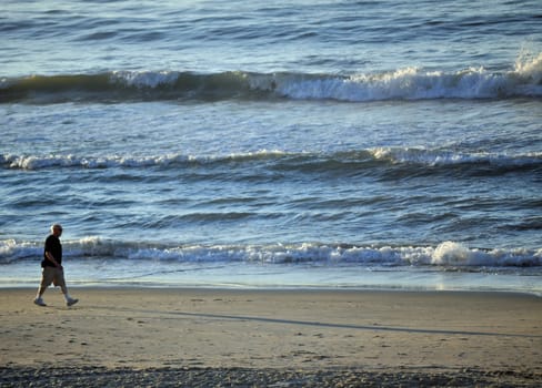 Man walking on beach