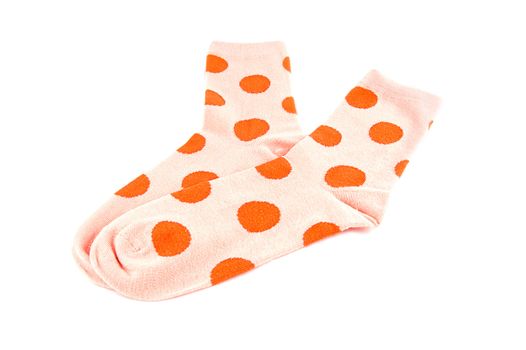 Pair of pink socks isolated on white background