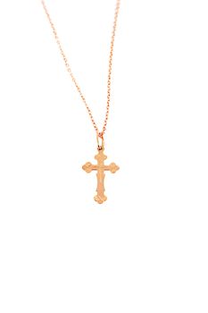 Golden cross with chain over white background