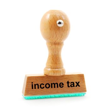 income tax concept with stamp in office showing bureaucracy