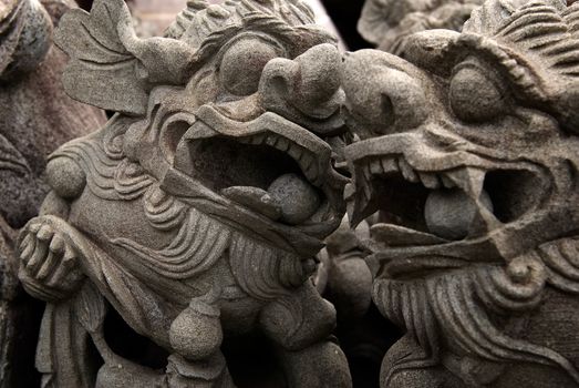 It is a traditional chinese carving of lion,just talk to each other.
