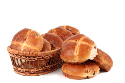 hot cross buns in a basket, white background