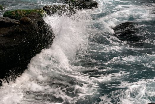 It is powerful waves beating the rock.