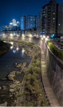 It is the commercial building and apartment with bridge.