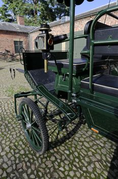 Candle powered headlight on a horse drawn carriage