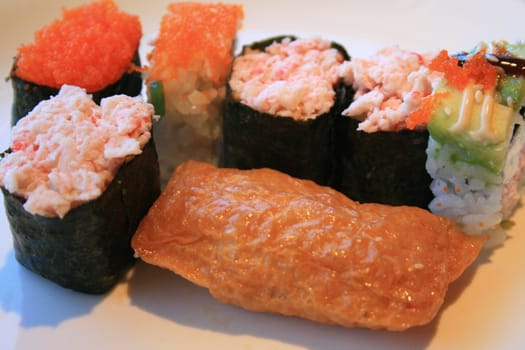 Close up of sushi assortment on a platter.