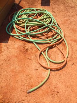 Water hose in a garden.