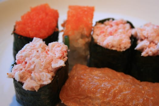 Close up of sushi assortment on a platter.