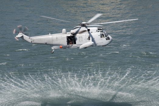 An Australian navy sea king helicopter practising a rescue