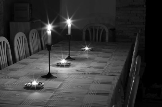 Table of a dining room in soft candlelight