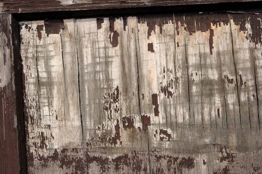 Old wood texture with painting falling apart