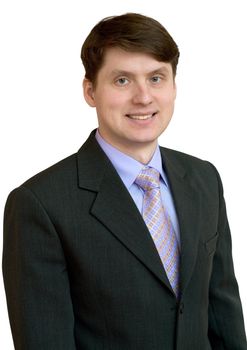 Portrait of the businessman in a shirt, tie and jacket