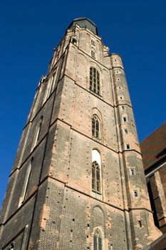 Saint Elisabeth Basilica, army church in Wroclaw, Poland. Main tower with blue sky as background.