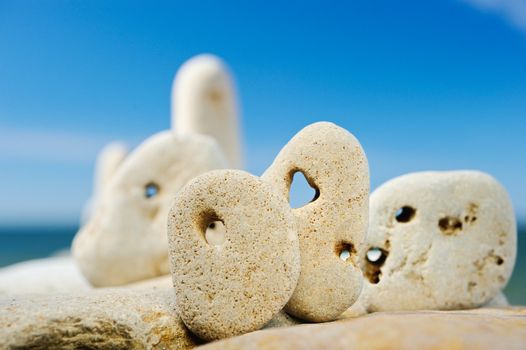 Natural holes and cracks in the white pebble