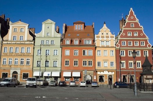 Colorful tenement houses in Wroclaw city - Flower Square, Poland. Redecorated and repainted houses in old style.