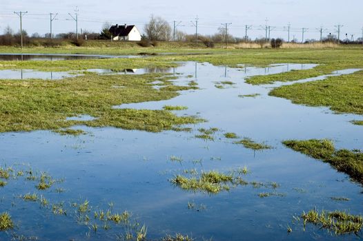 Poland, Lower Silesia province with open fields, wet meadows and single houses.