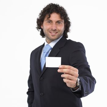 Man with business card in the hand isolated on white