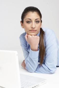 isolated young girl with laptop