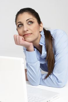 isolated young girl with laptop