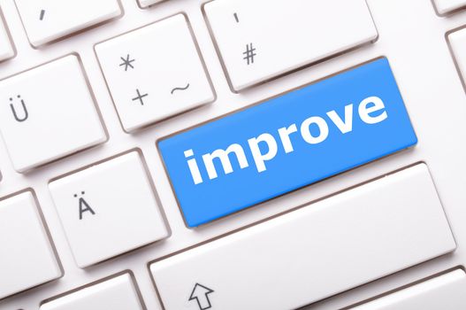 improvement or improve on key or button showing investment concept
