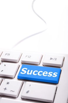 success word on button or key showing motivation for job or business