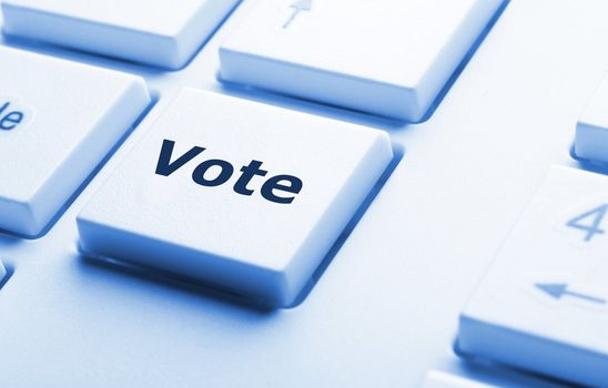 vote word on key or keyboard showing election concept