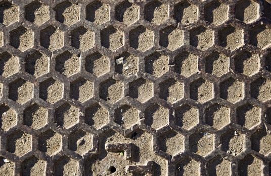 Metal texture in the form of honeycomb. Close-up, front.