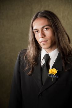 Handsome man in formal jacket with boutonniere