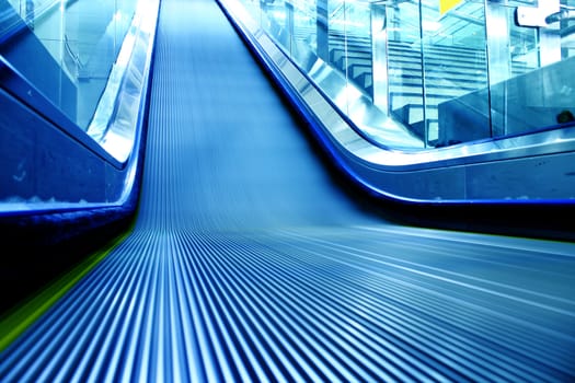escalator of the subway station in modern building .