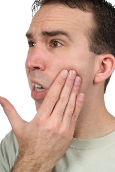 Closeup view of a man holding his mouth and suffering from a toothache