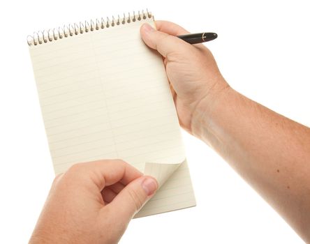Male Hands Holding Pen and Pad of Paper Isolated on a White Background.