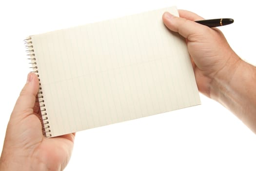 Male Hands Holding Pen and Pad of Paper Isolated on a White Background.
