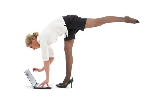 flexible businesswoman with laptop computer over white