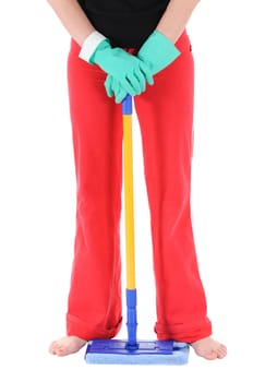 The woman in green gloves holds a mop