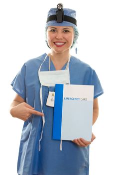 Surgeon or nurse holding information booklet, fact sheets or brochure.  White background.