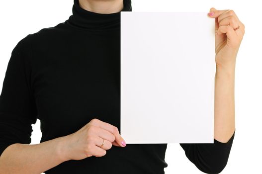 The woman holds empty sheet of paper isolated on white background