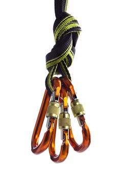 Three carabiners on the climbing rope over white background