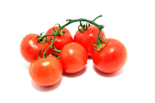 beautiful red tomatoes over white background