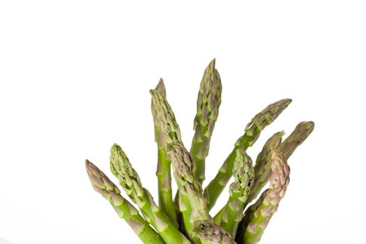 detail of fresh green asparagus isolated on white background