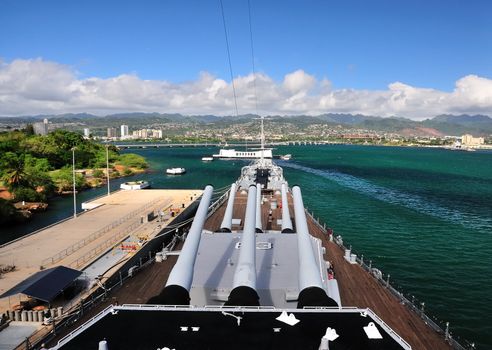 USS Missouri bridge and 16 inch gun turrets looking to USS Arizona Memorial